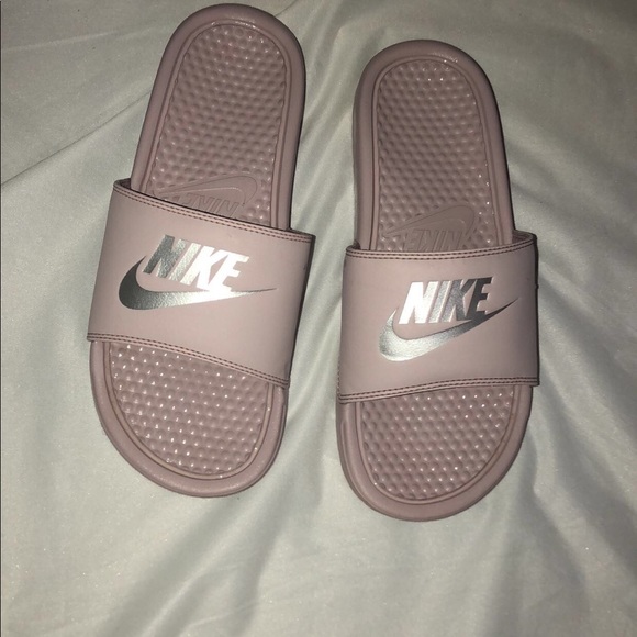 pink and silver nike slides